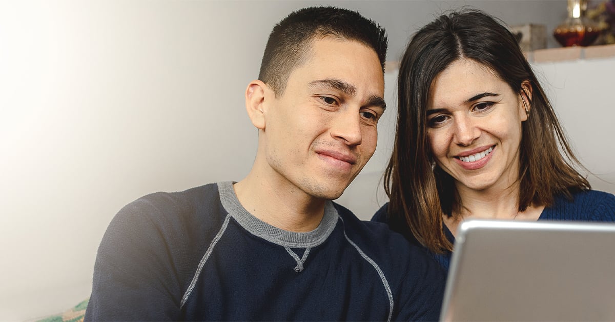 Couple Looking at Computer